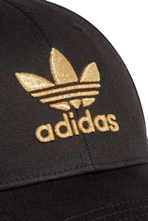 adidas pet zwart met goud|adidas Originals .